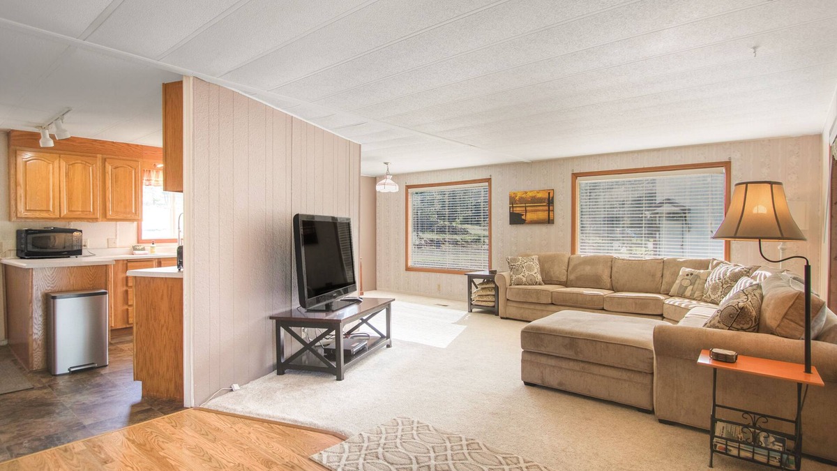 Harrison House | Inviting lakefront home with dock, fireplace, mountain view, & W/D