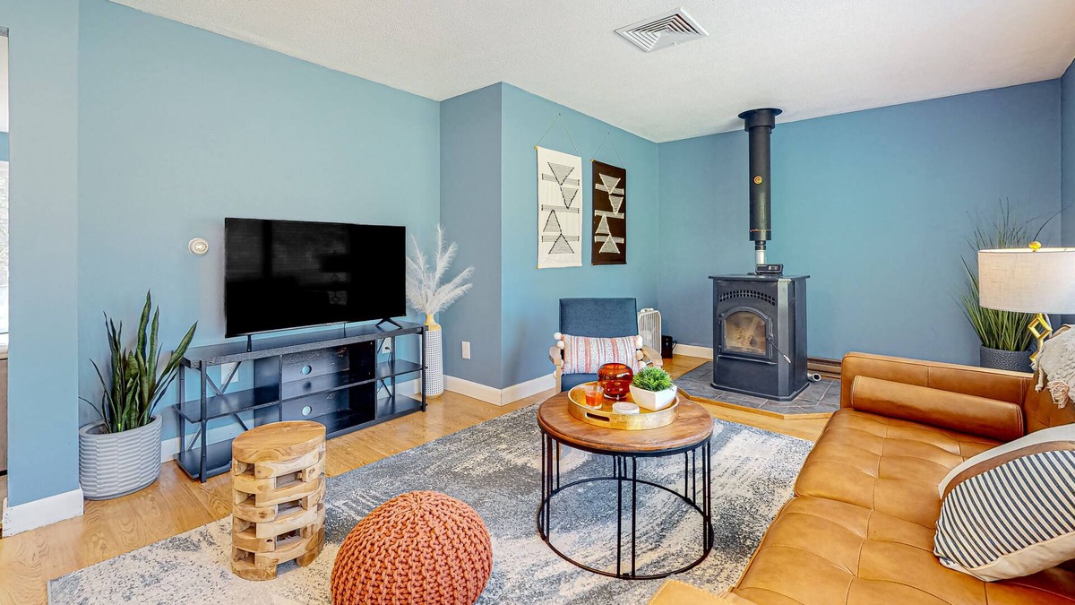 Barnstead House | Inviting riverfront home with pool, kayaks, firepit, & W/D