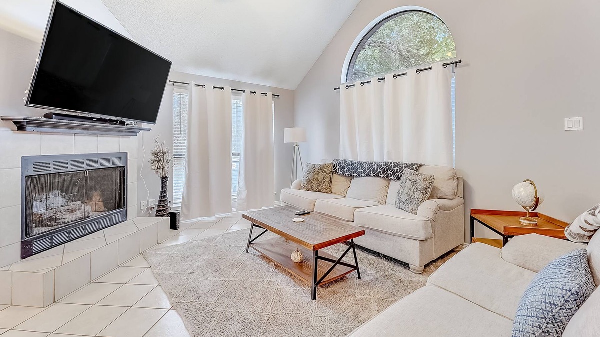 Dallas House | Inviting, two-story home on a large lot with a private pool, gas fireplace, & AC