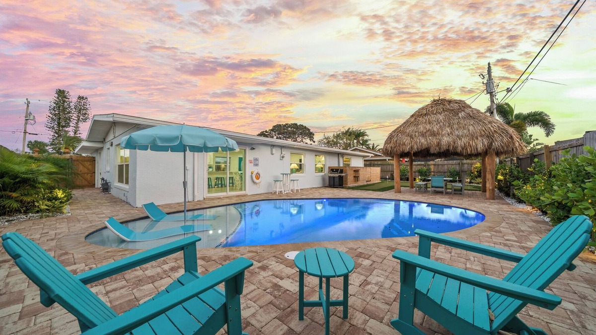 Surfside Estates House | Island Oasis with Heated Pool, Putt Putt Course, Tiki Bar, and Beach Gear!