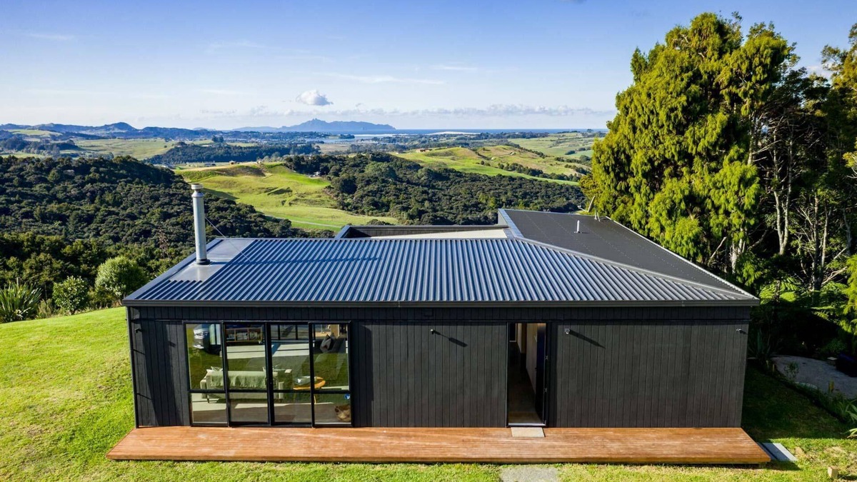 Mangawhai House | Island View - Designer holiday home with fabulous indoor outdoor living and spectacular views