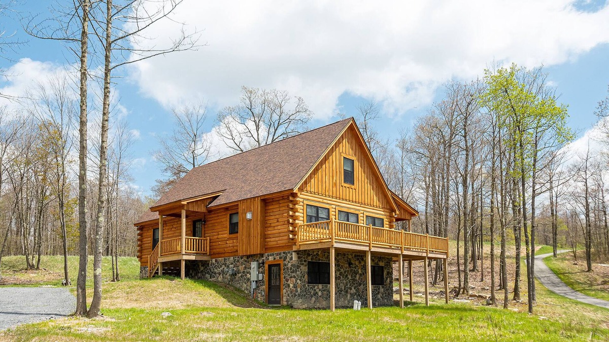 McHenry House | John's Place | Pet-Friendly Cabin, Wooded Views, Minutes to Wisp!