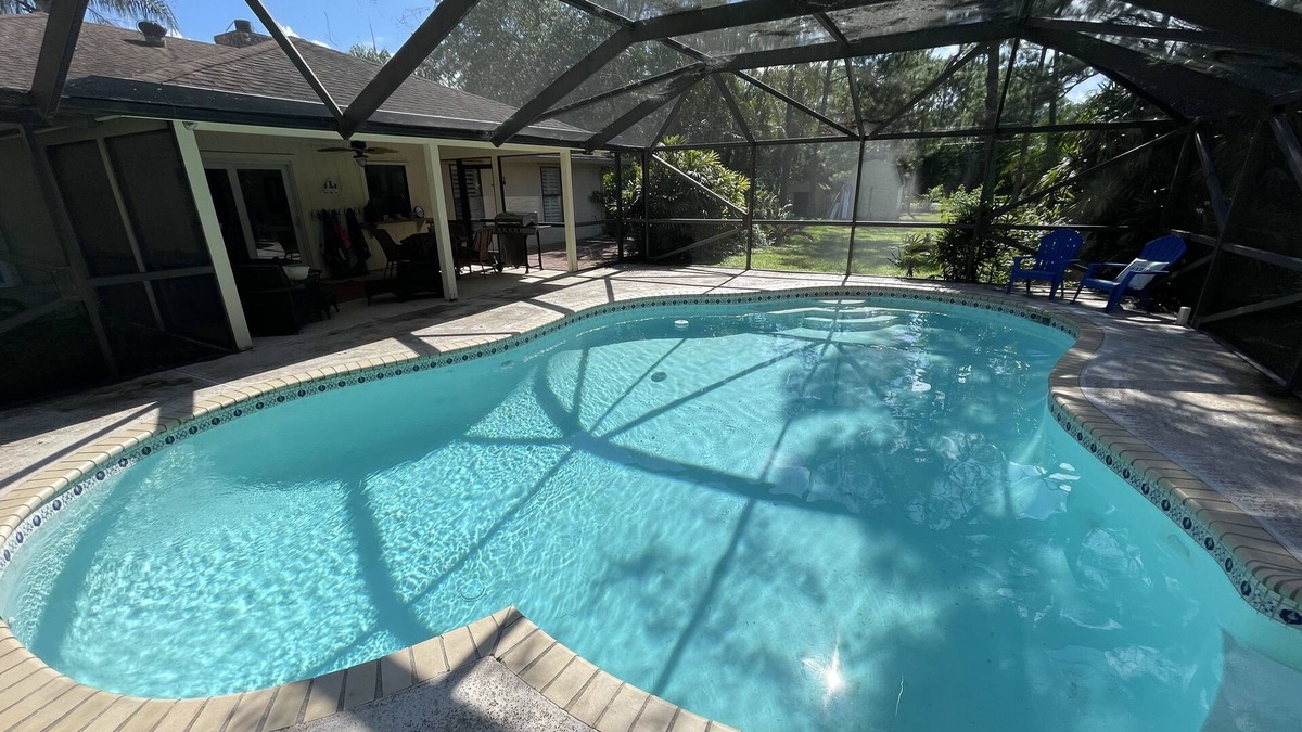 Jupiter Farms House | Jupiter - 3 Bedroom, HEATED Pool Home on an Acre of Land, with Home Theater!