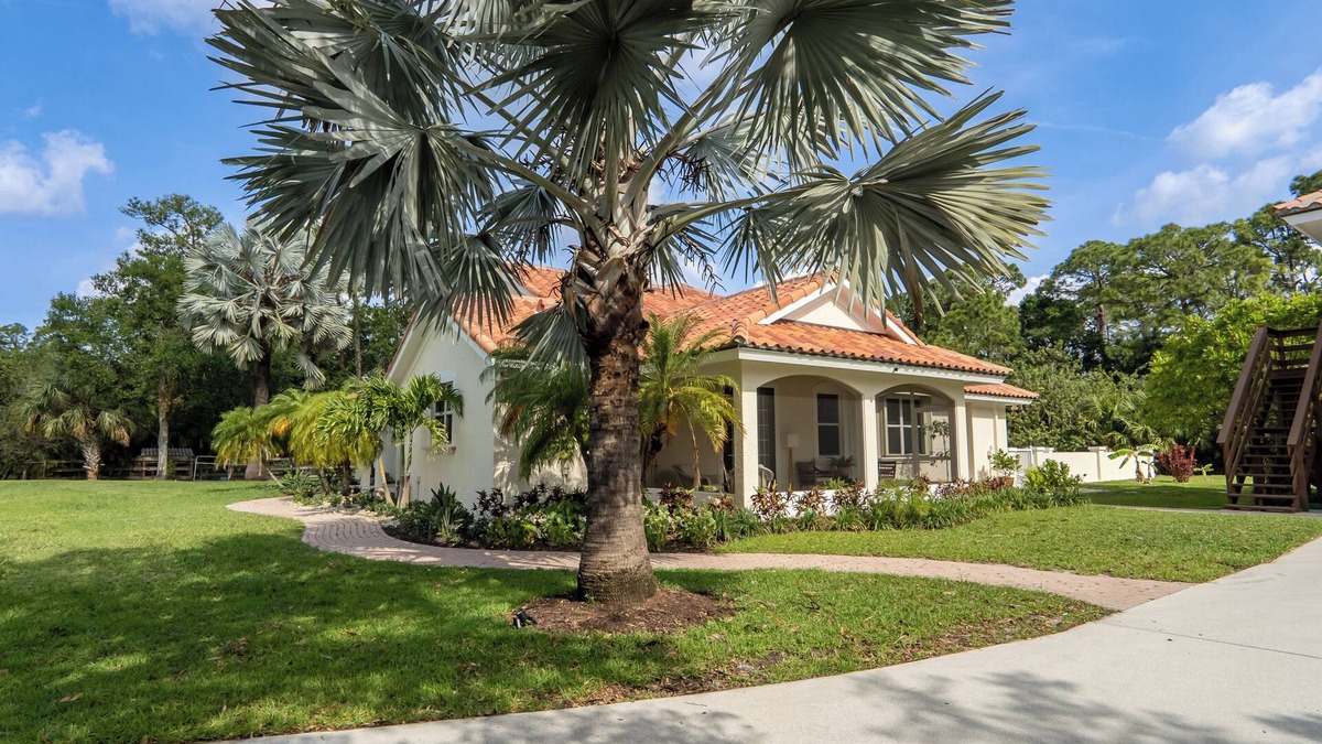 Jupiter Farms House | JUPITER FARMS TIKI PARADISE! Private, heated pool, Monarch Butterfly Waystation.