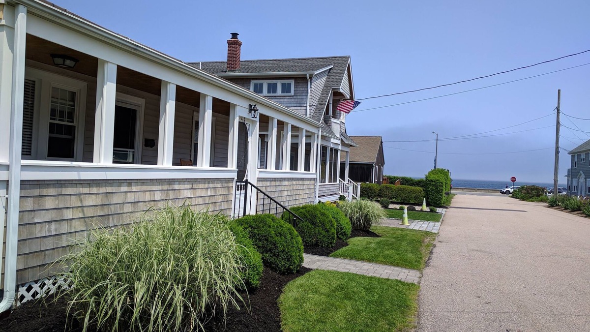 Narragansett Pier Cottage | Just reduced! Great location! Feet from the seawall, walk to Narr. town beach.