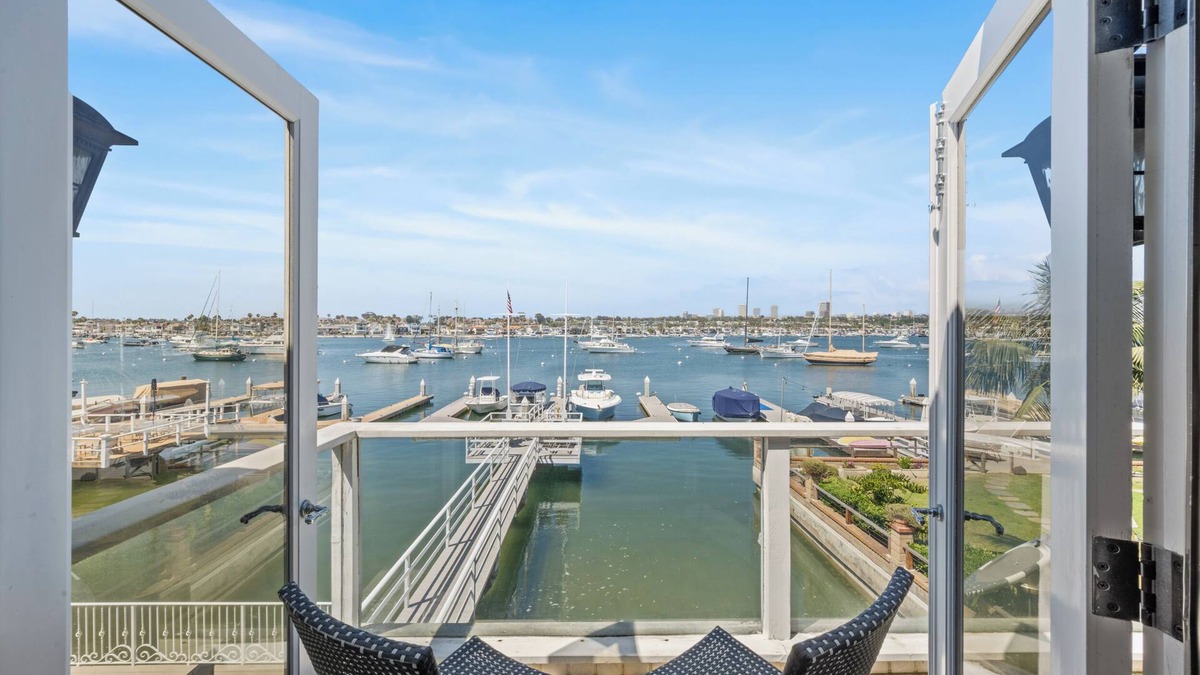 Balboa Peninsula House | Just Renovated Bay Facing Coastal Home with a Dock