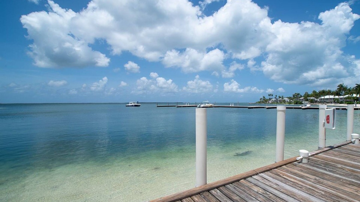 Rum Point Condo | Kaibo Yacht Club 10 - 'Kokomo Kai' - 2nd floor beachfront - by Cayman Villas