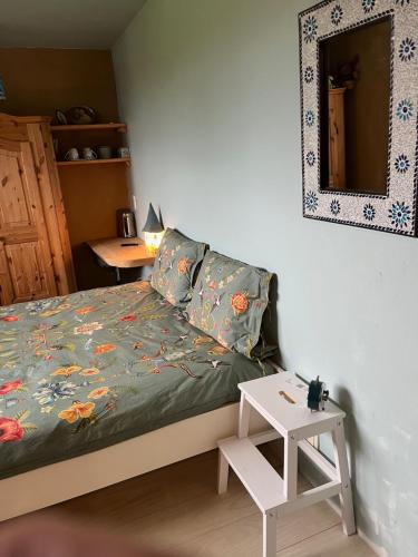 Wommersom Bed & Breakfast | Kamer in een Strobalen huis