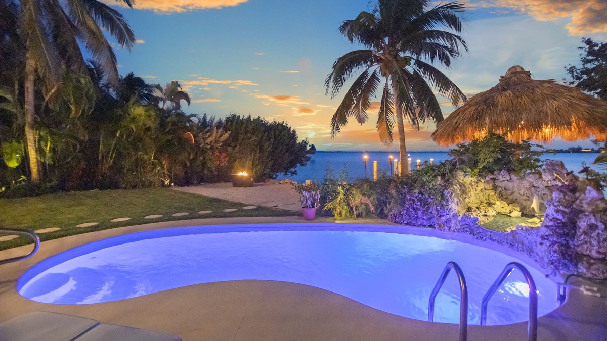 Bay Point House | Key West Beach House with heated pool, tiki, and dock.♿︎
