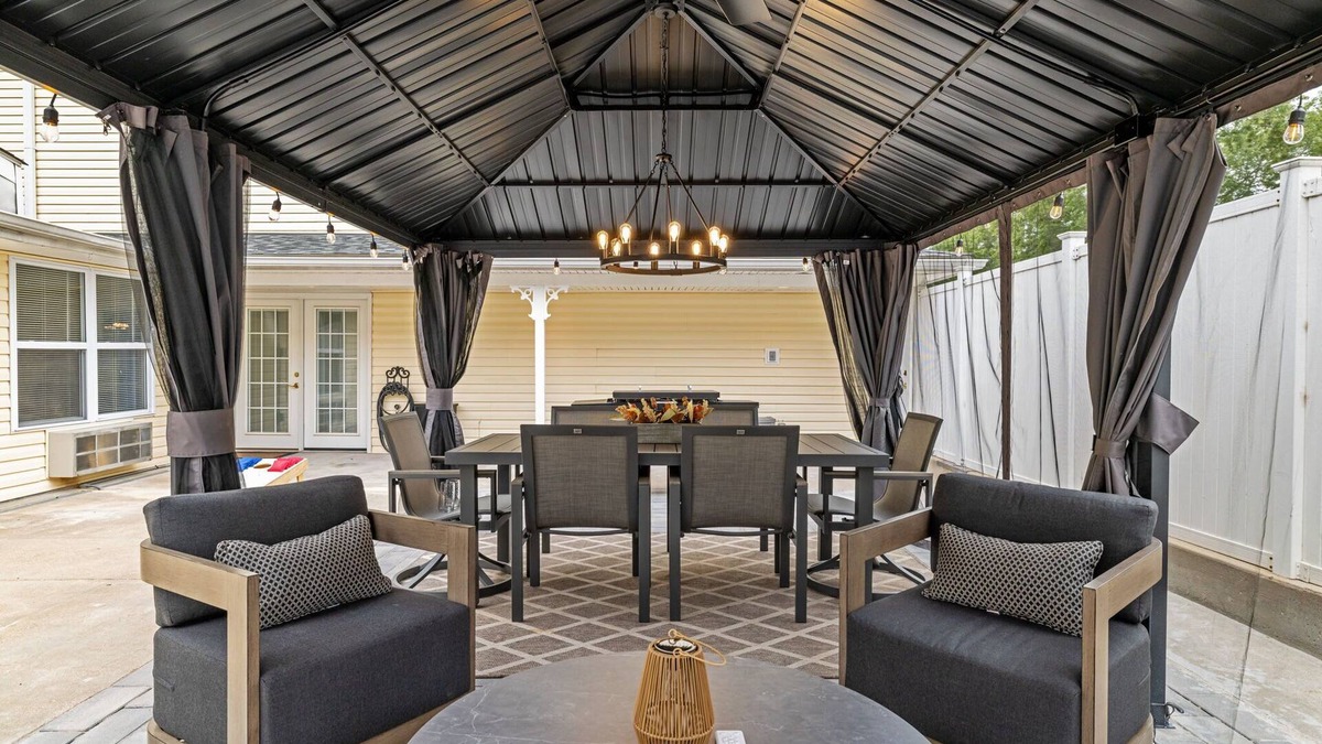 Kimmswick House | Kimmswick Porch Haven: Hot Tub, Cozy Fire Pit, & Fenced Yard!