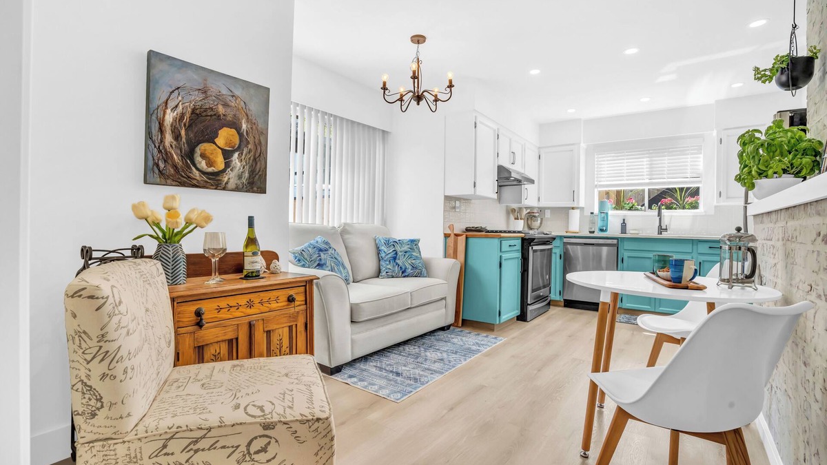 Lynn Valley House | King Bed with front door parking and private courtyard. Designed for living.