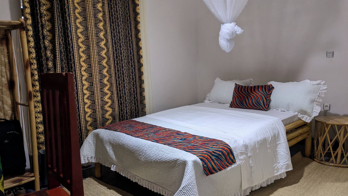 Ruhondo Apartment | KING ROOM located in Lake view and Volcanos view