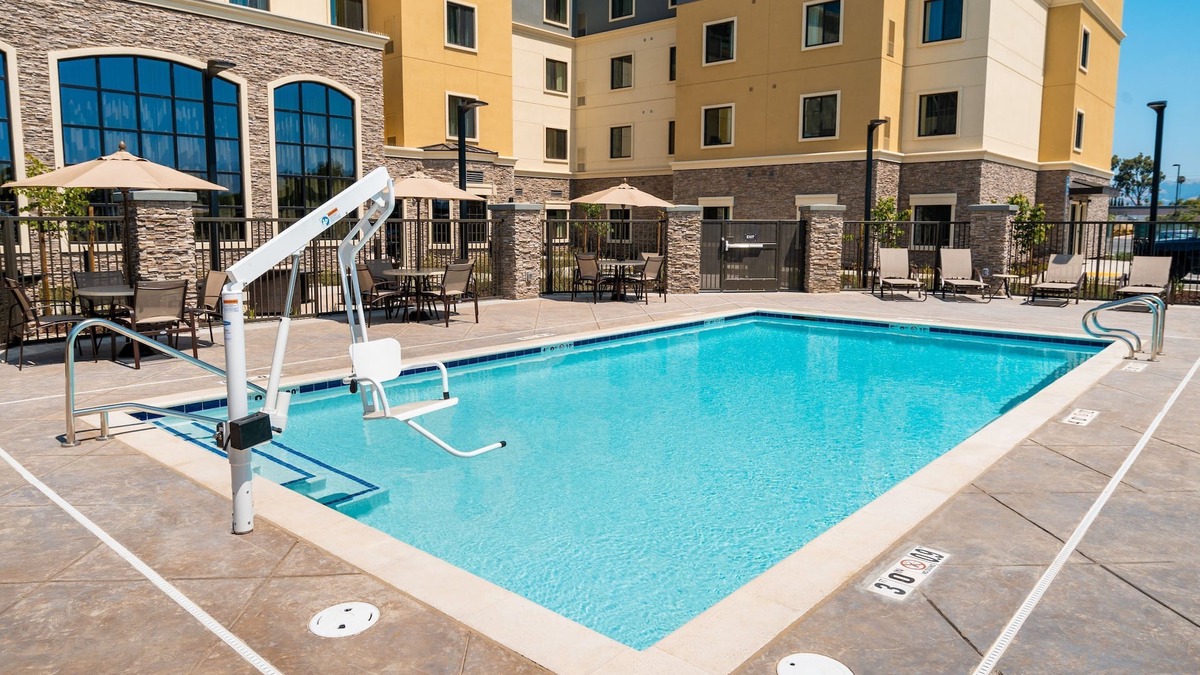 Newark Condo | King Suite. Free Breakfast. Pool. Shared BBQ. Great for Business Travelers!