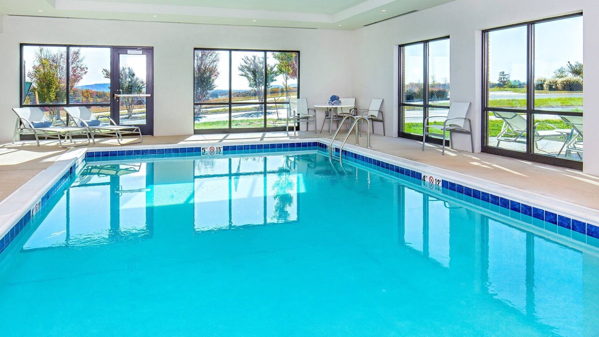 Rio Condo | King Suite Near University of Virginia + CHO | Free Breakfast, Pool Access