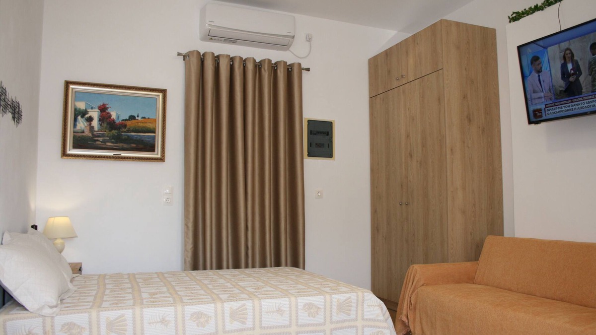 Atalanti Apartment | KOLLITAKI - apartment on the beach road. Couple or family of three friendly