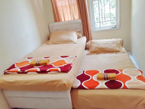 Bogor Timur Hotel | Kost Carmelia Syariah Baranangsiang Bogor