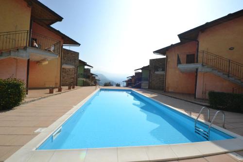 Tavernola Apartment | La casa di Gabry in residence con piscina comune