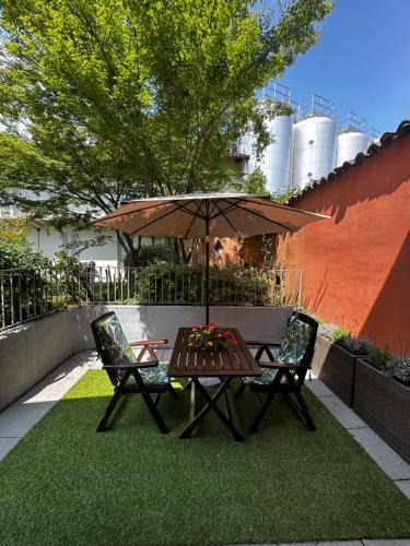 Riva Apartment | La Casetta del Centro Luminoso loft con terrazzo e giardino