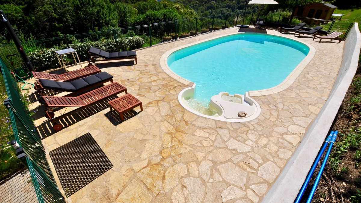 Riols Cottage | La Chataigne - stylish, family friendly gite with heated pool, playground and terraces