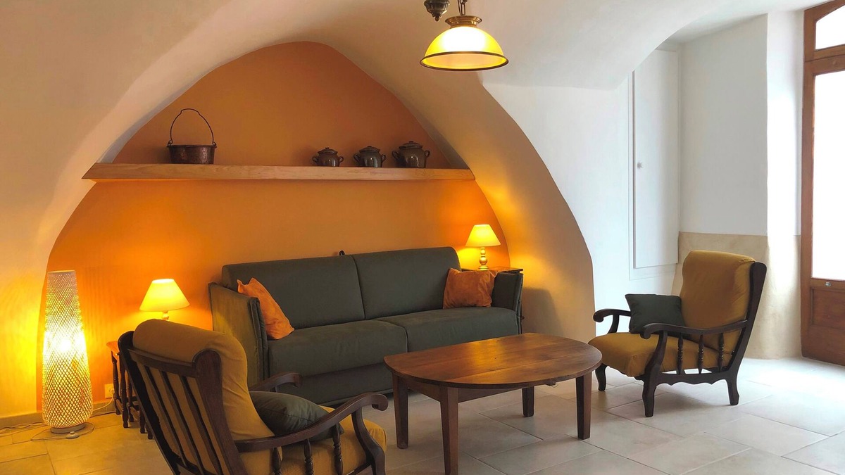 Montpeyroux House | "la maison de Marie" 17th century village house stone arches courtyard + terrace
