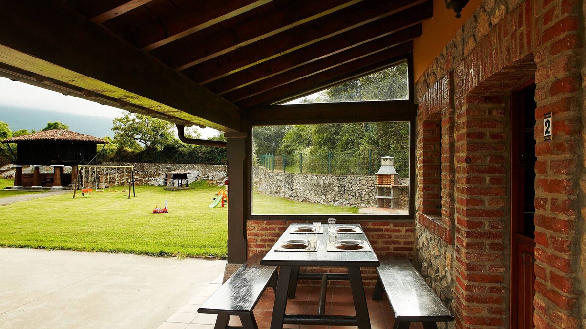 Llamigo Apartment | La Rotella de Xuan: Apartment 'Amarillo' with Mountain View, Private Terrace and Shared Garden