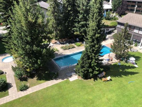 Laax Apartment | Laax with indoor and outside pool, sauna, 200 Meter to Ski lift , Fitnessroom, Tennis Place, Joyroom, Parkstadion Reserve