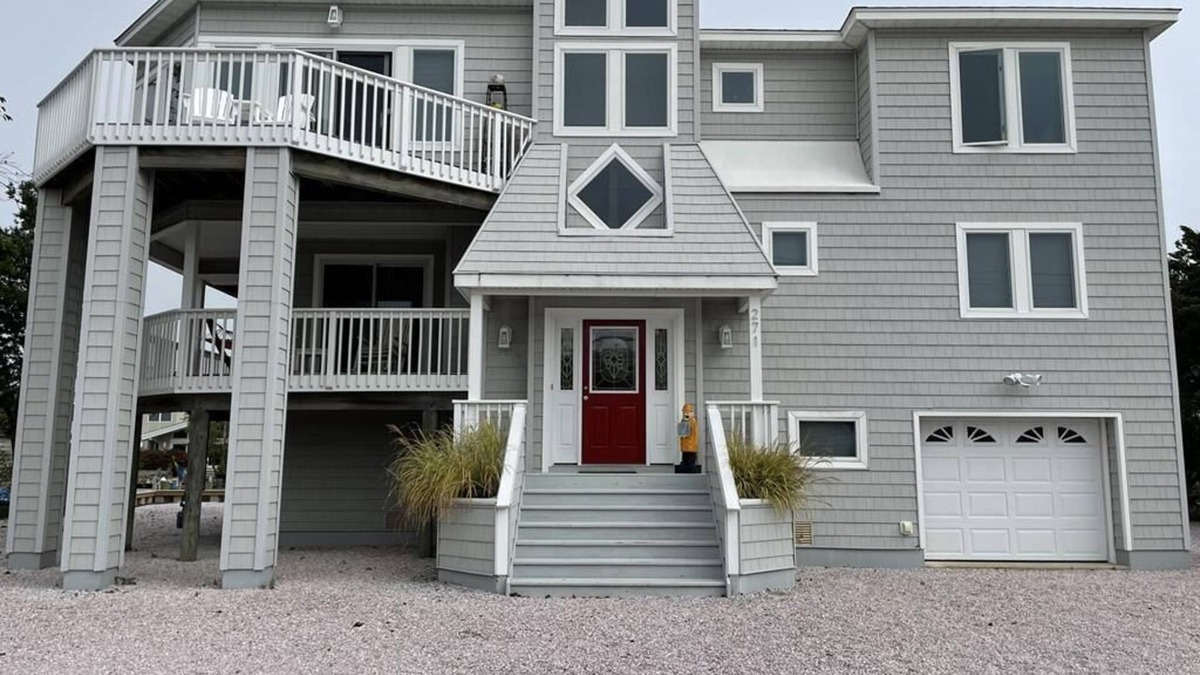Loveladies House | Lagoon front. Loveladies. Dock. Decks. Beach Badges. Bikes. Ping Pong table.