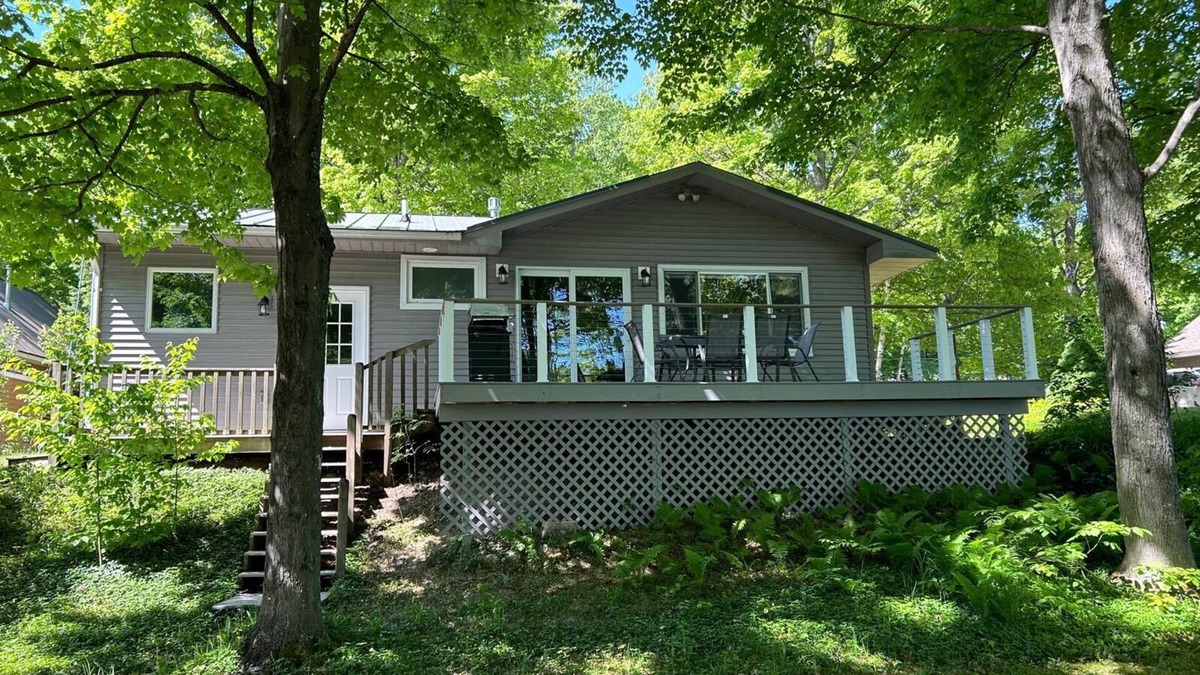 Lake Ann Cottage | Lake Ann, MI cozy waterfront cottage, newly remodeled with private beach & dock