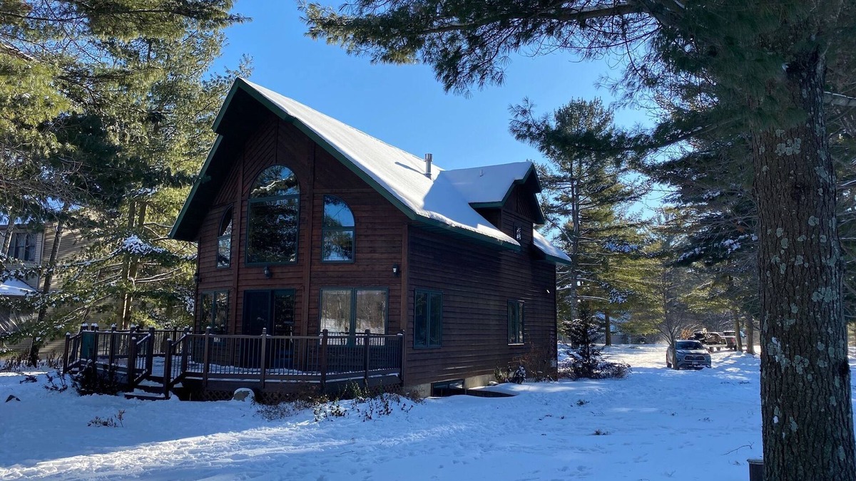 Holcombe House | Lake cabin on Holcombe flowage. Loft views, fire pit, and nearby hiking.