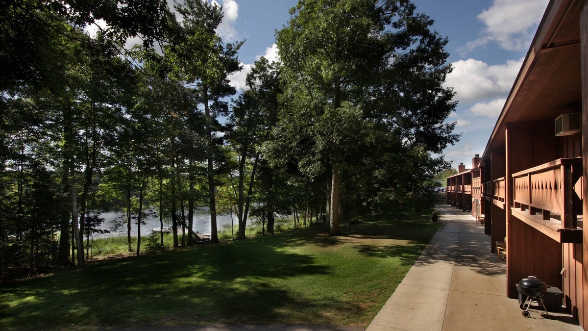 Eagle River Condo | Lake Forest Resort – Relax on a Pristine Sandy Beach in the Northwoods!