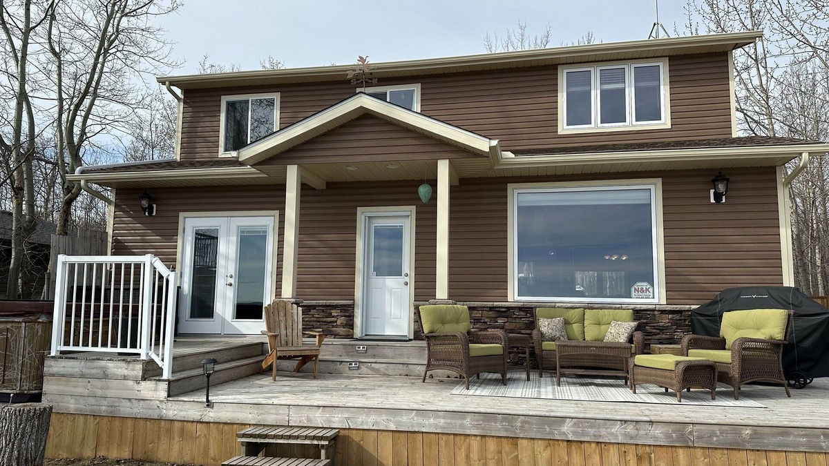 Westerose Cabin | Lake front cabin w/hot tub & firepit, close to The Village at Pigeon Lake.