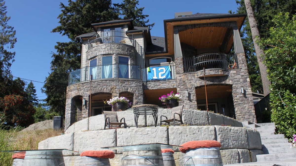 McKenna Bed & Breakfast | Lake Front Castle Style Custom Home Partial Lake View Balcony Suite
