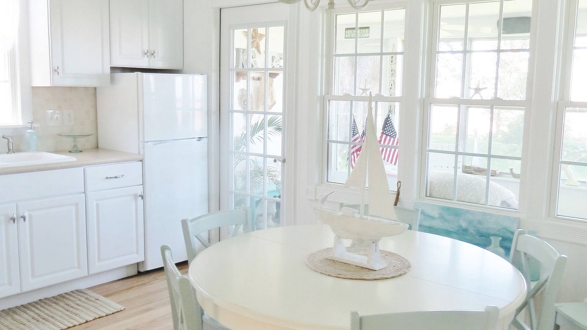 Vermilion House | Lake Front Cottage Home with Second Story Balcony Double Lot