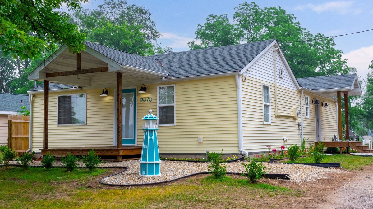 Dowling House | Lake front home with access to two lakes, large yard and RV hookup available!