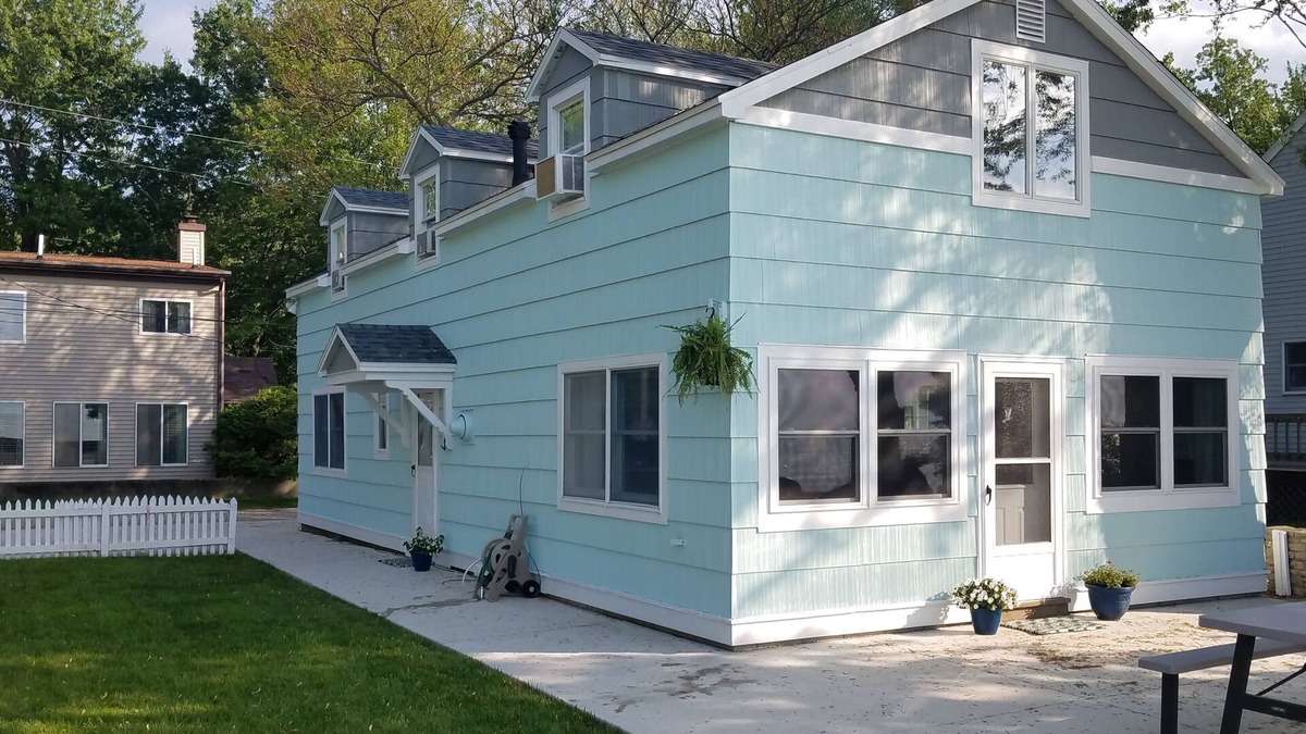 Gypsum House | Lake Front Nautical Themed Home with Private Yard & Sandy Bottom Water Access!