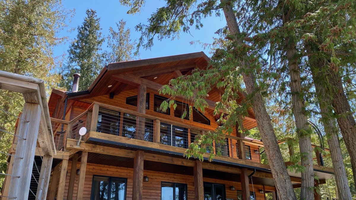 Eagle Bay Cottage | Lake Front Paradise! With Multiple Decks, Fire Pit, hot Tub, Dock, Bouy