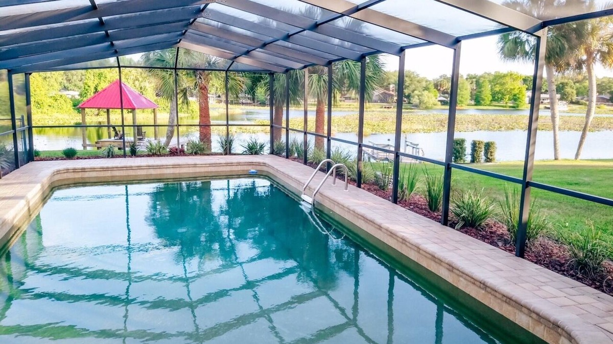 Inverness House | Lake Front, Pool Home with Boat Dock