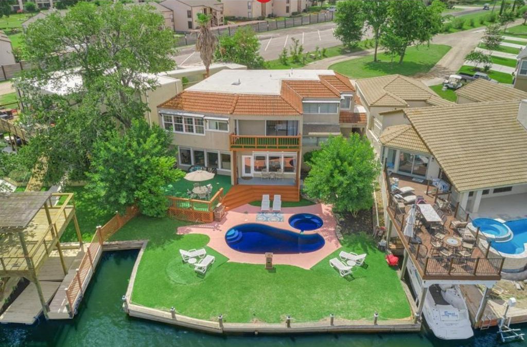April Sound House | Lake front retreat with pool, spa, golf, fishing, boat slip, 4 bed, 4 bath sleeps 21