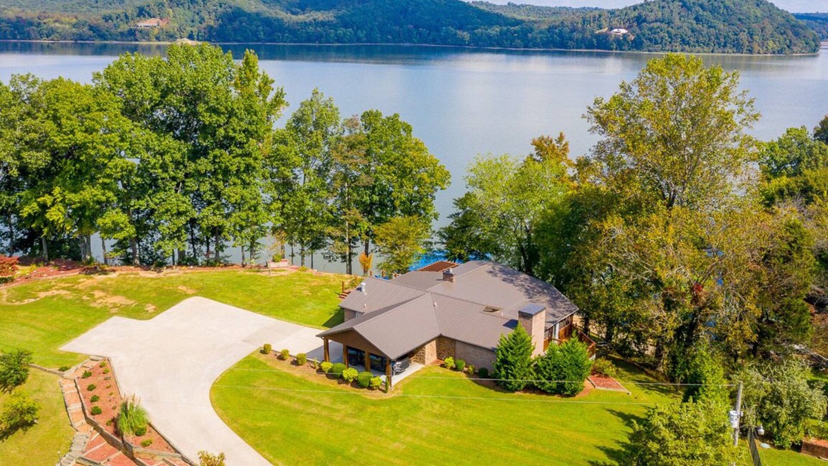 Stewart House | Lake front with dock and boat ramp