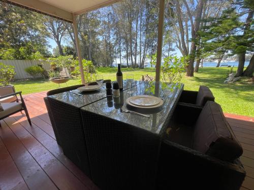 Brightwaters House | Lake House Escape - Lake Front Couples Retreat!