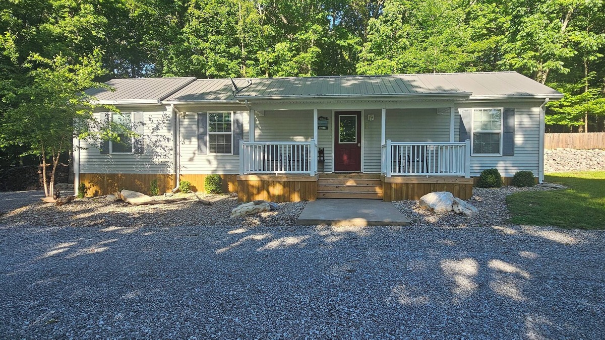 Kuttawa House | Lake House with easy water access, limited water view, sitting on 4 acres.