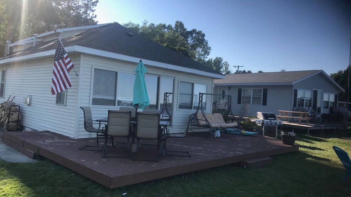 Cadillac House | Lake Mitchell Lakefront Rental, very sandy lakefront. great ice fishing lake