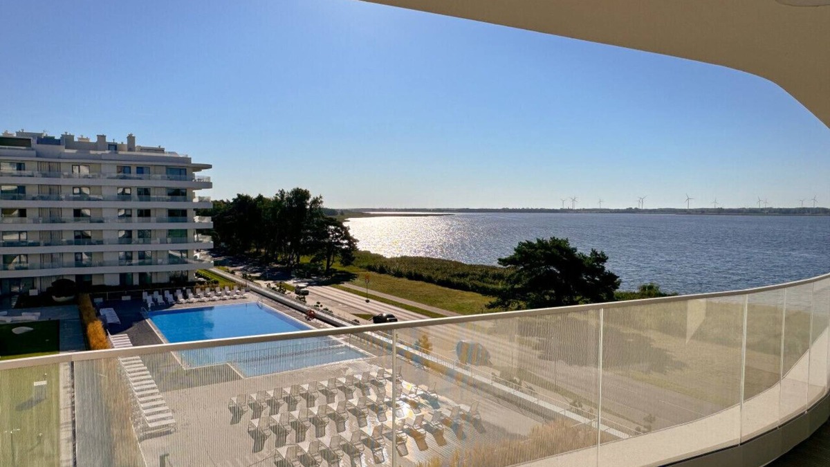 Trzebiatow Apartment | Lake pool view with private beach access Garage