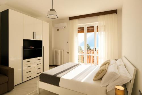 Vassena Apartment | Lake View Apartment - Parking Included