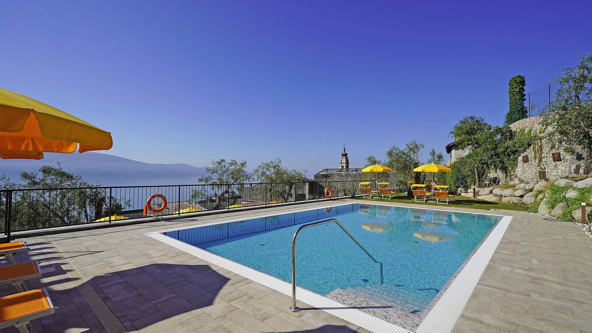 Gargnano Condo | lake view apartment quiet location parking and swimming pool in the olive trees.