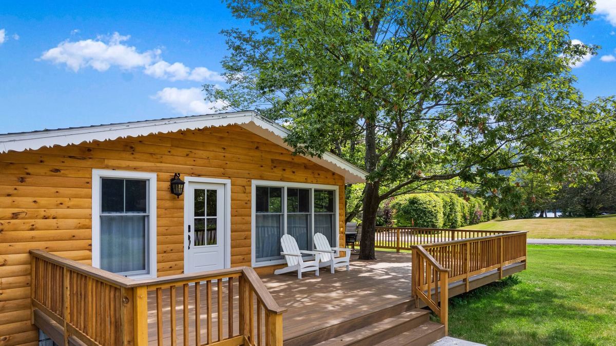 Silver Bay House | Lake-view home with large deck, grill, lawn, & mtn views - dog-friendly