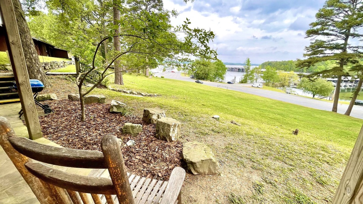 Mount Ida Apartment | Lake view queen Guest Room with two queens, sleeper sofa and deck overlooking Lake Ouachita. by RedAwning
