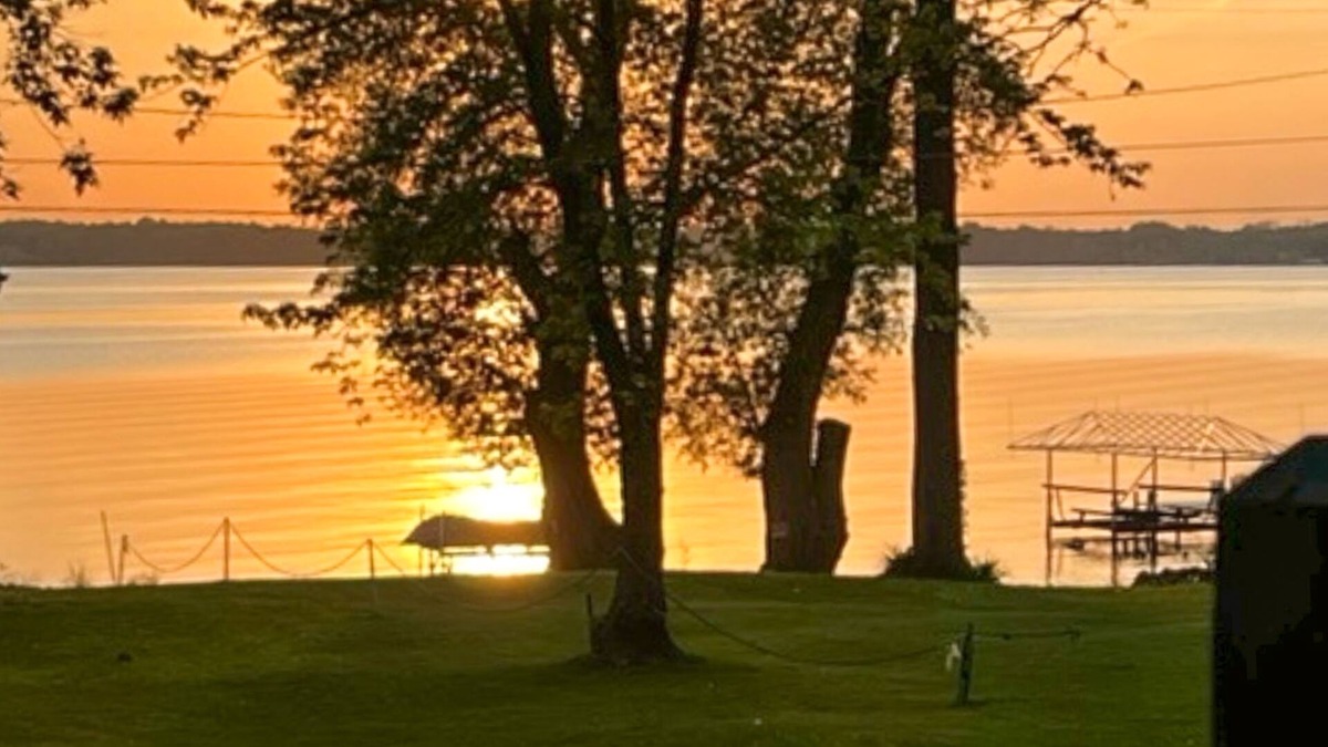 Cayuga House | Lake-view retreat with dock access, firepits, & large yard