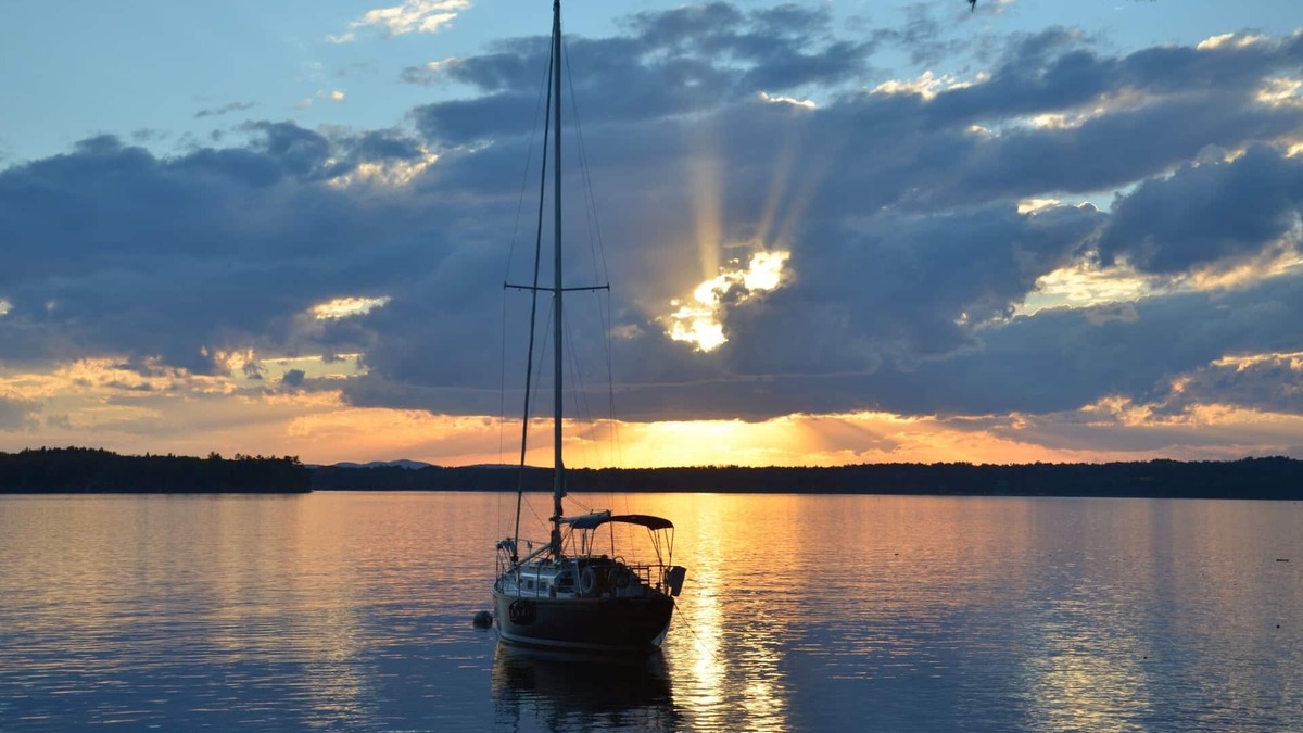 Melvin Village Condo | Lake Winnipesaukee beachfront property.