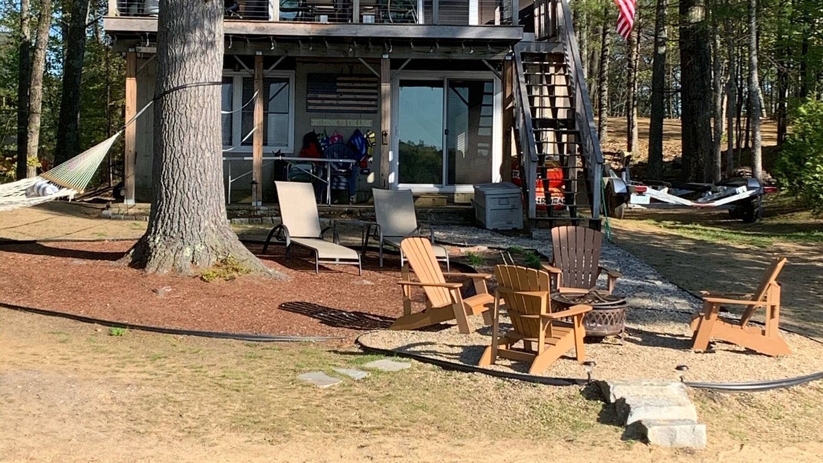Lochmere House | Lake Winnisquam home with beach and private boat dock. 15 minutes to Gunstock.